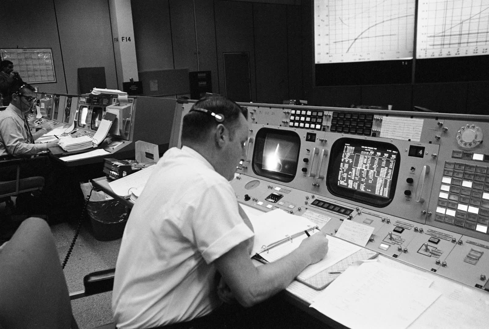 An operator at a monitoring console